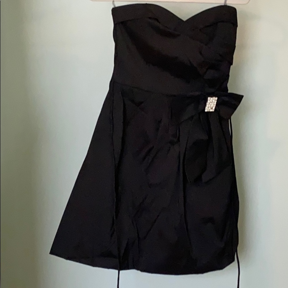 Black cocktail dress with crystal bow detail